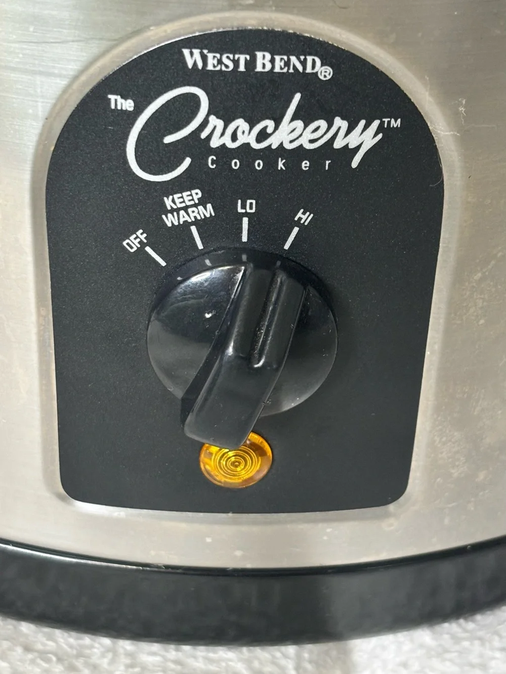 West Bend Crockery Stainless Steel Slow Cooker in Black and Silver